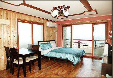 Seaside House Pension Seogwipo Habitación foto